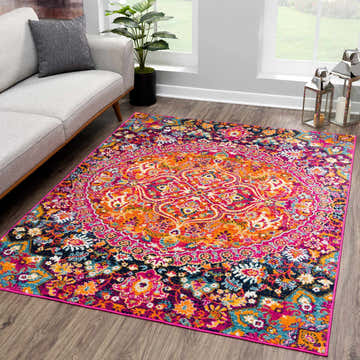 Living room scene with a Harput Lively Colors Rug, gray sofa, wood floors, and natural light. Roomscene-Rectangle