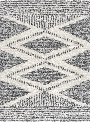 Close up of the Trunding Plush Area Rug. Charcoal and cream shag rug with a geometric diamond pattern. Design-Rectangle-5373