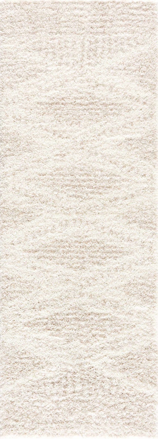 Close-up of the Hauteloom Trunding Plush Rug in Light Beige. Shag rug texture with cream and light beige tones. Design-Runner-2773