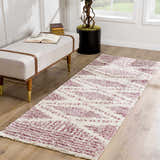 Entryway with a Trunding Plush pink runner rug, light wood floors, and a bench with books. Roomscene-Runner