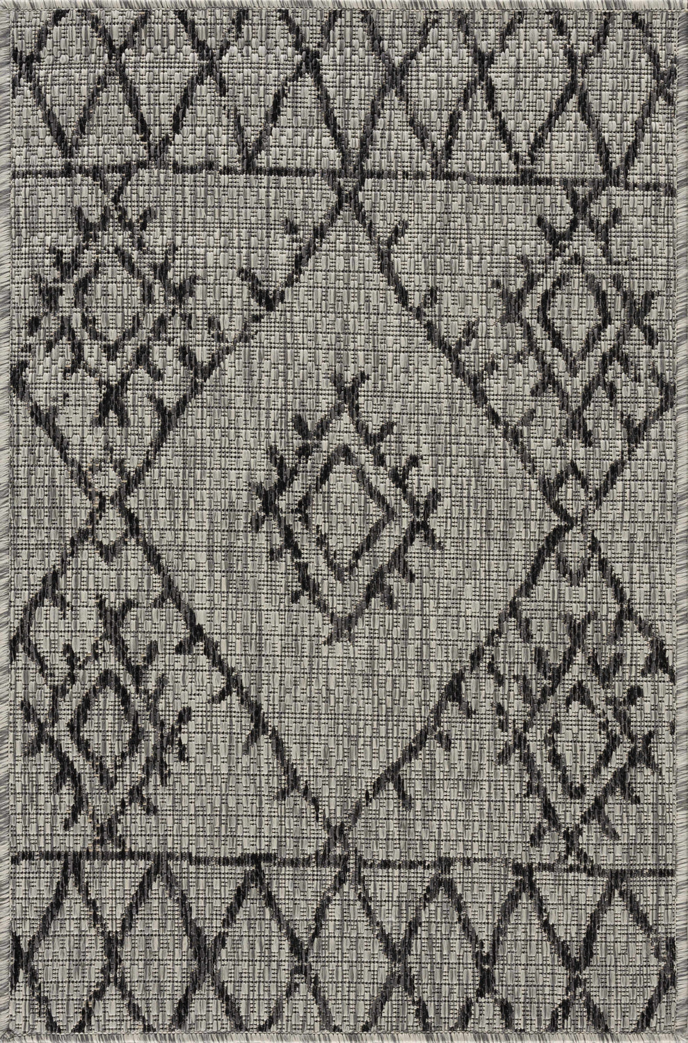 Close-up of the Marwood Nordic Performance Rug, featuring a black geometric pattern on a taupe and white woven background. Design-Rectangle-23