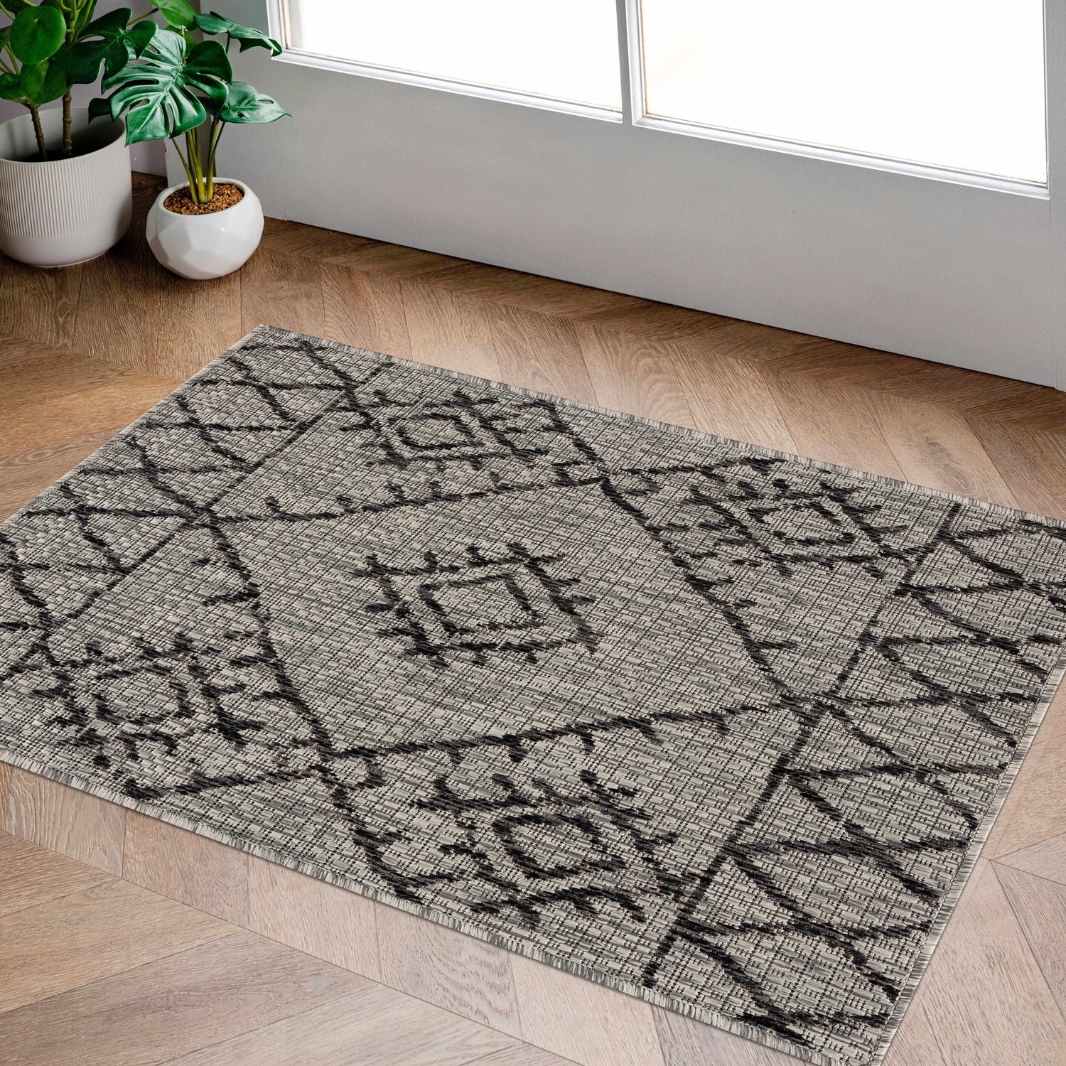 Entryway scene with a Marwood Nordic Performance Rug in black and taupe on wood floors. Roomscene-Rectangle