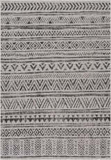 Close-up of the Catrine Indoor & Outdoor Rug, showcasing its black and white bohemian-inspired geometric pattern and woven texture. Design-Rectangle-5373