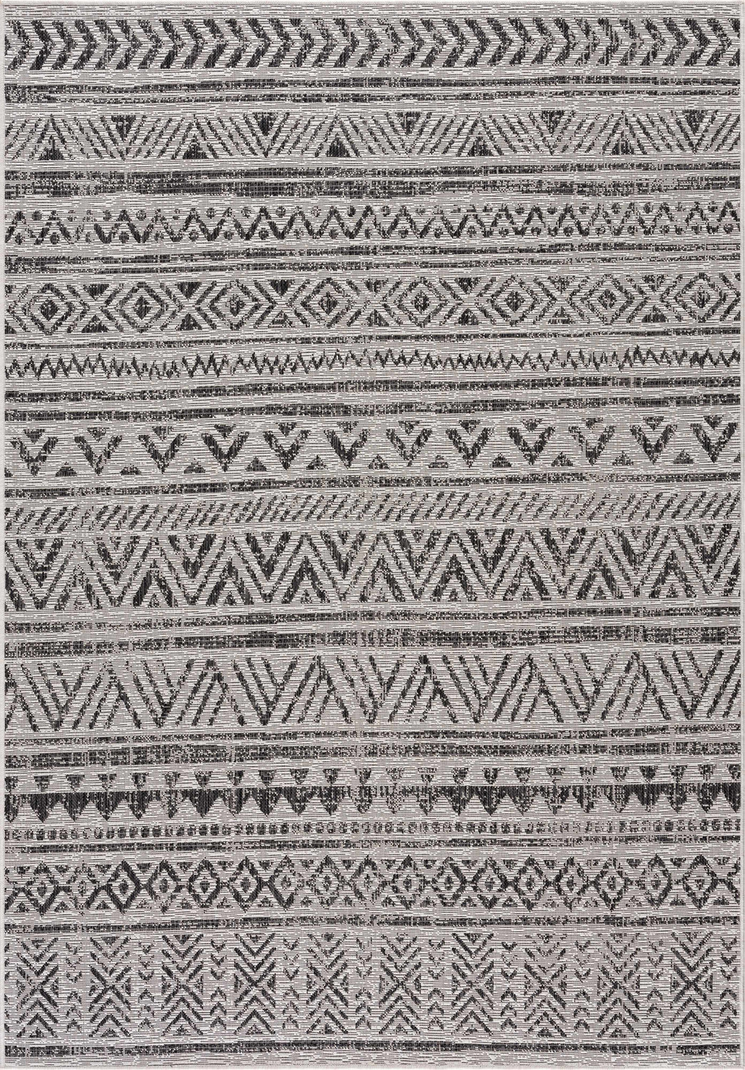 Close-up of the Catrine Indoor & Outdoor Rug, showcasing its black and white bohemian-inspired geometric pattern and woven texture. Design-Rectangle-5373