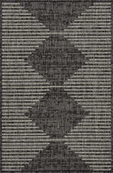 Close-up of the Stephan Area Rug featuring a black, charcoal, and cream Southwestern-inspired geometric pattern. Design-Rectangle-23