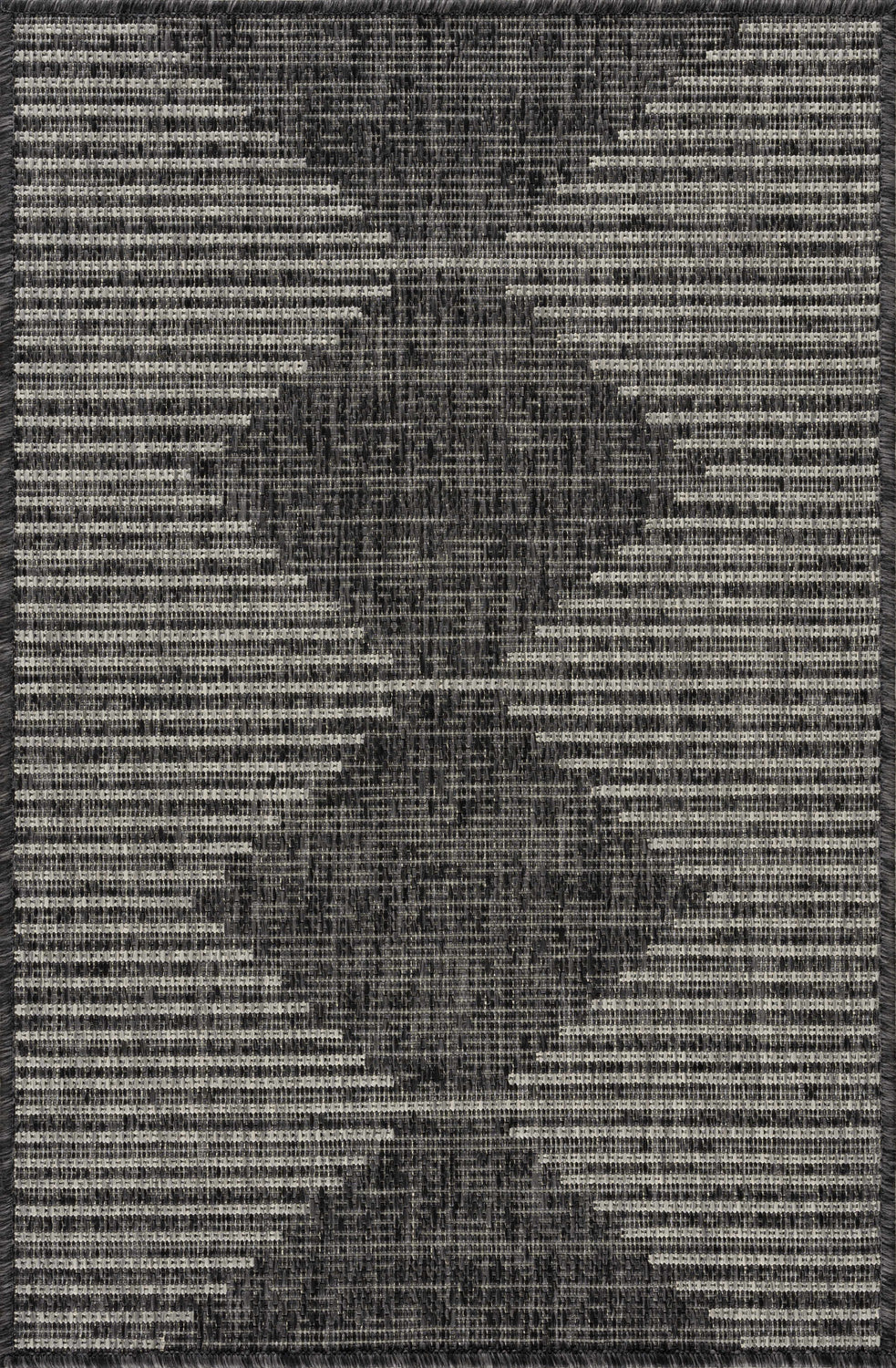 Close-up of the Stephan Area Rug featuring a black, charcoal, and cream Southwestern-inspired geometric pattern. Design-Rectangle-23