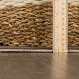 Close-up of Coty Washable Jutely Rug showing jute texture, off-white border, and rug thickness with a ruler. Pile