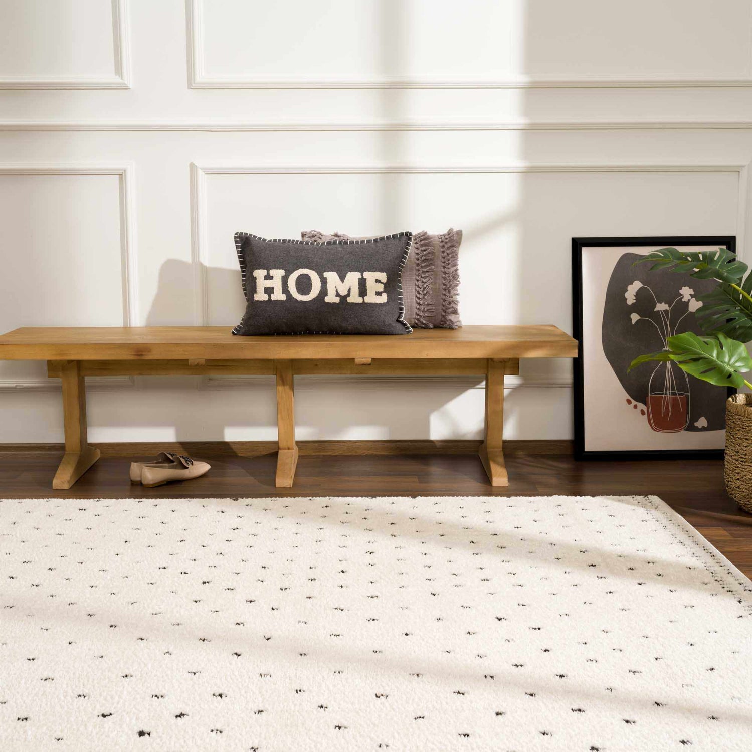 Entryway scene with a beige Julie Area Rug featuring a black polka dot pattern. Roomscene-Rectangle