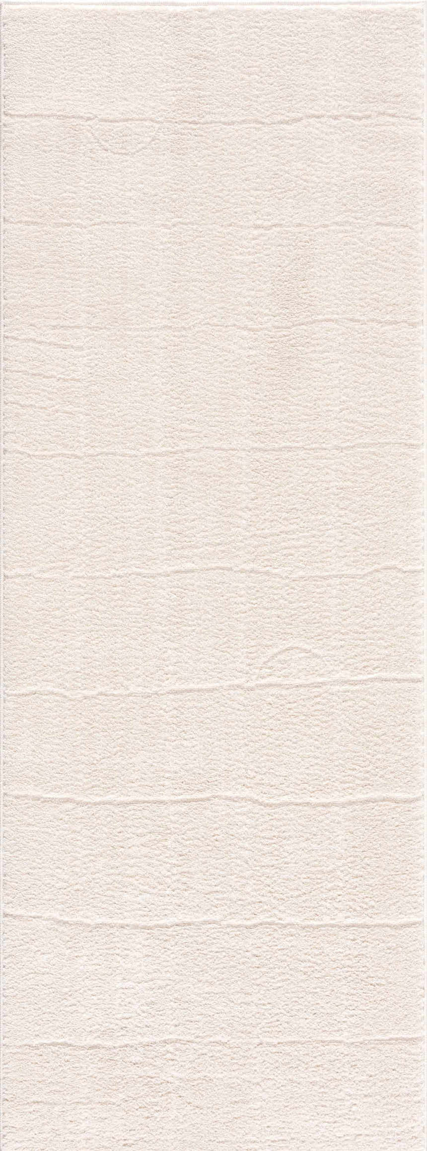 Close-up of the Keanu Ivory Area Rug, showing its soft texture and subtle horizontal line pattern. Design-Runner-2773