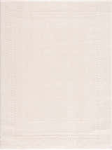Close-up of the Julio Ivory Area Rug featuring a subtle geometric pattern and soft, textured weave. Design-Rectangle-537