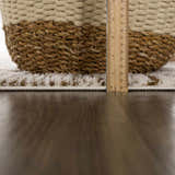 Close-up of the plush Leryn Brown Checkered Rug, showing its thickness with a ruler next to a woven basket. Pile