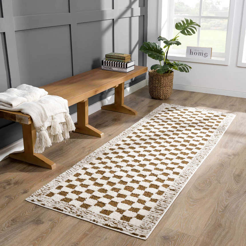 Entryway scene with a Leryn Brown Checkered Plush Rug, wood bench, throw blanket, and potted plant near a window. Roomscene-Runner