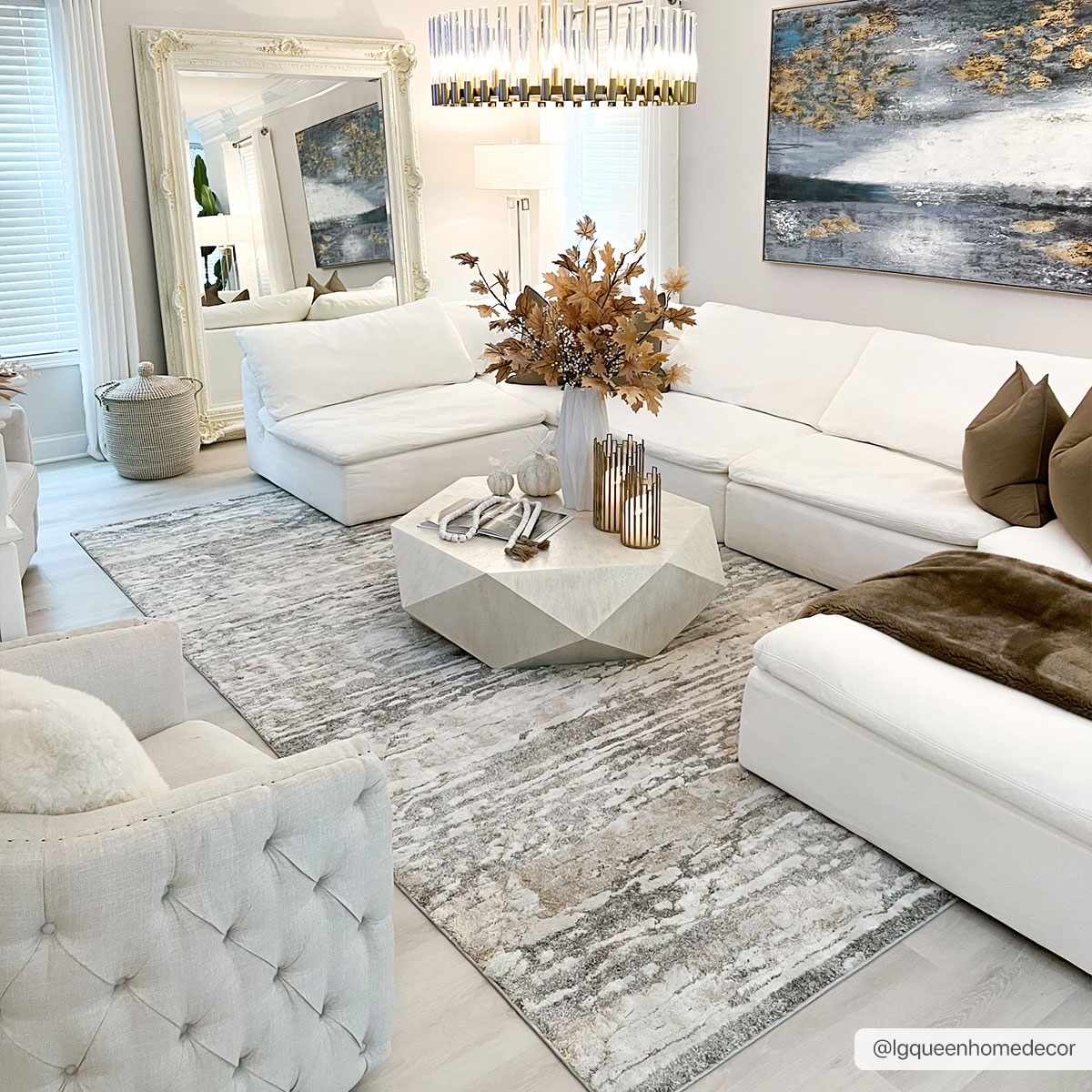 Living room scene with white sectional and Ferrelview Area Rug in gray, ivory, and tan. Roomscene-Rectangle