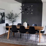Dining room with wood table, black chairs, and Greenpoint Dusty Blue Washable Rug. Modern farmhouse style. Roomscene-Rectangle