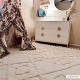 Kids room with a floral teepee and the bone-colored geometric Gyundyukoru Area Rug, dresser, and decor. Roomscene-Rectangle