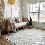 Kids room with a rattan daybed and the bone-colored Gyundyukoru Area Rug featuring a geometric pattern. Roomscene-Rectangle