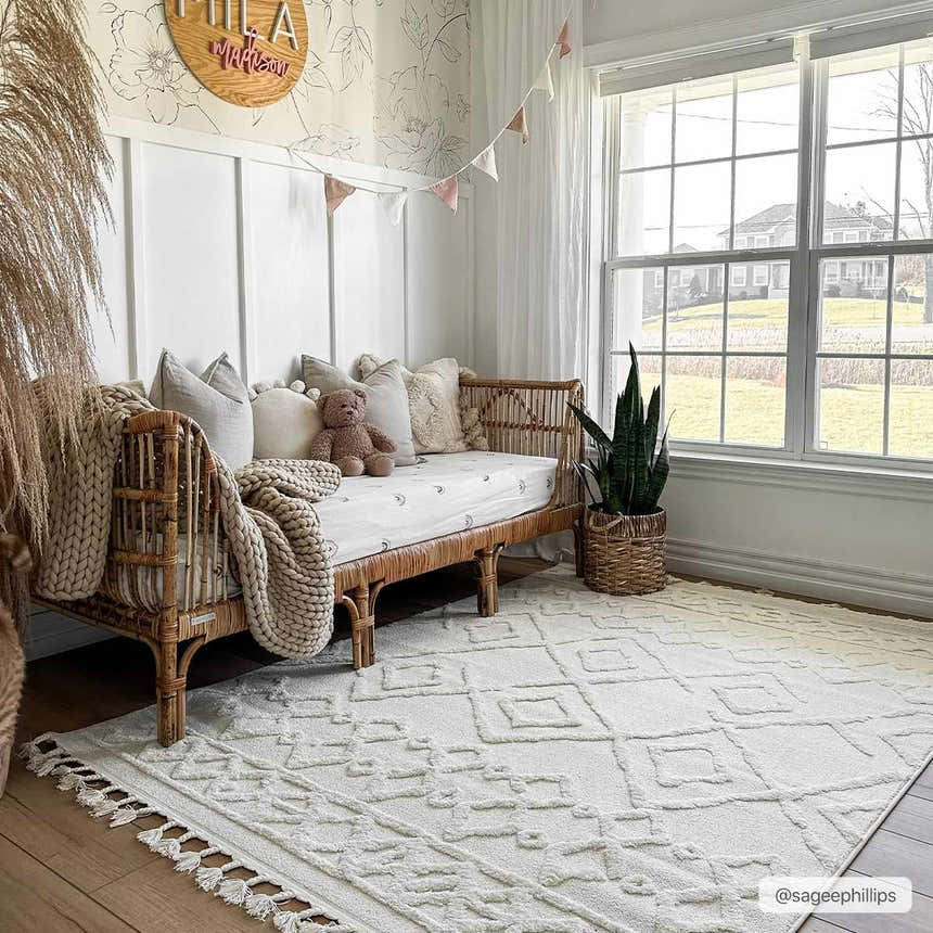 Kids room with a rattan daybed and the bone-colored Gyundyukoru Area Rug featuring a geometric pattern. Roomscene-Rectangle
