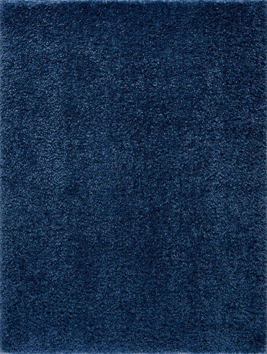 Close-up of the plush texture of the Faina Solid Dark Blue Shag Washable Area Rug. Design-Rectangle-46