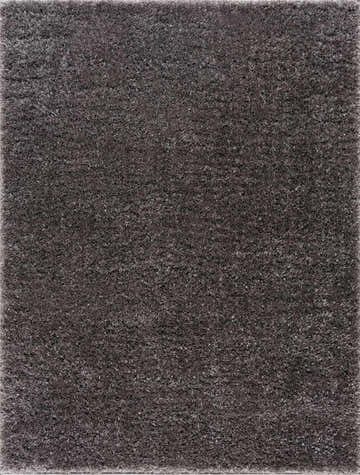 Close-up of the plush texture and dark gray color of the Faina Solid Shag Washable Area Rug. Design-Rectangle-46