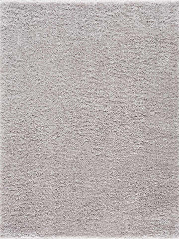 Close-up of the plush texture of the Faina Solid Light Gray Shag Washable Area Rug. Soft, dense pile. Design-Rectangle-46