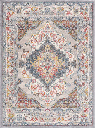 Detailed Haymond Area Rug close-up. Features a traditional, floral pattern in brick red, charcoal, cream, and blue tones. Design-Rectangle-5373