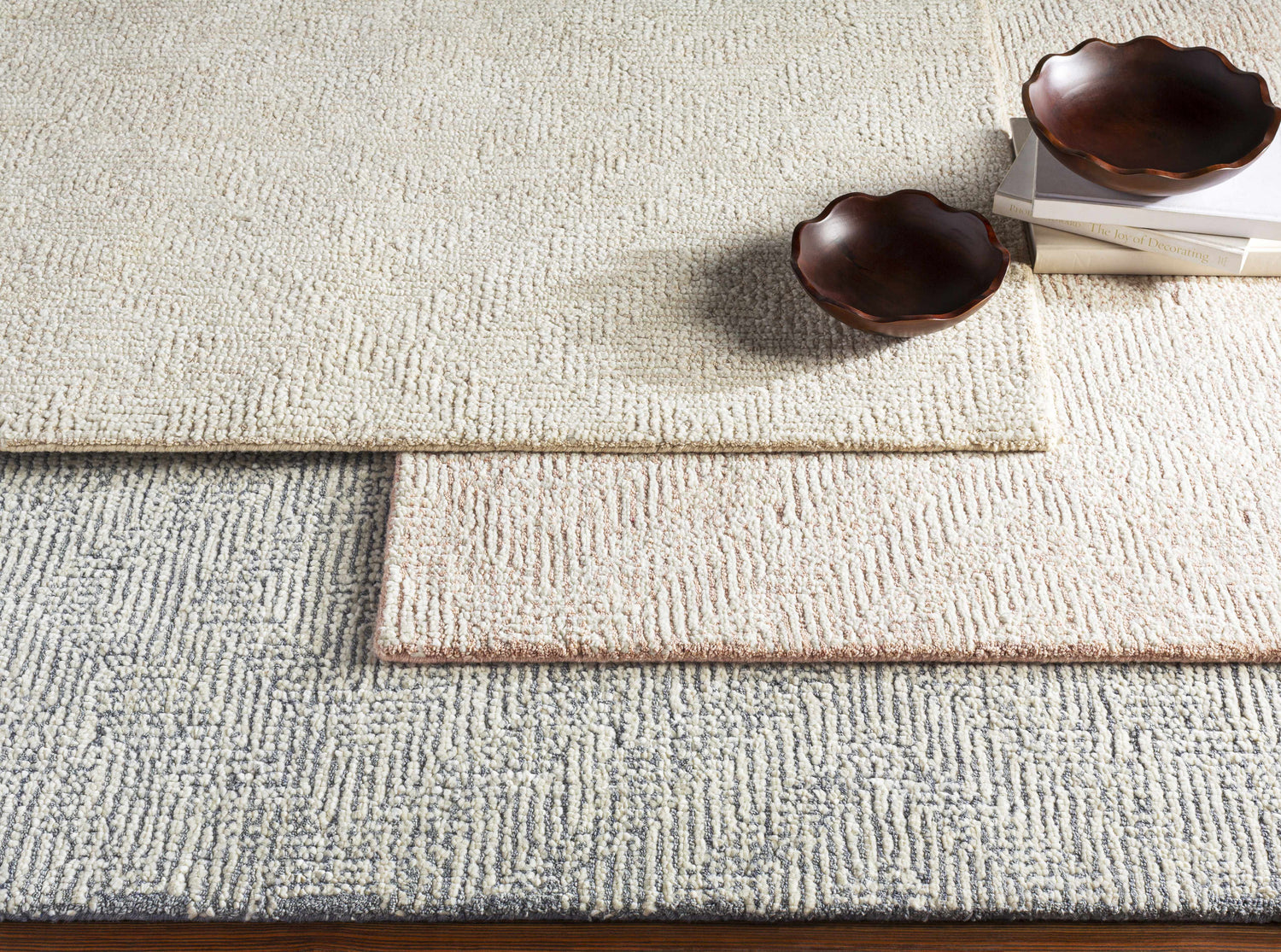 Close-up of textured Delahey Area Rug in charcoal, cream, and tan. Hand-tufted wool rug with contemporary design. Styleshot