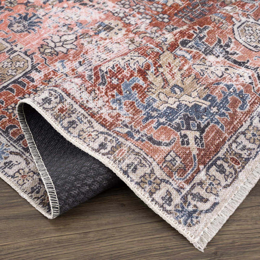 Close-up of the Burgundy Holi-2303 Washable Area Rug showing its traditional, vintage pattern and colors. Fold