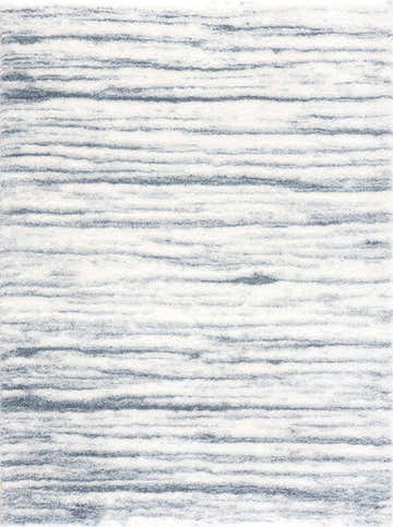 Close-up of the Mette Area Rug: a white shag rug with subtle, horizontal blue stripes. Contemporary style. Design-Rectangle-537