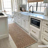 Farmhouse kitchen with white cabinets and Halle Beige Washable Area Rug runner on light wood-look tile. Roomscene-Runner