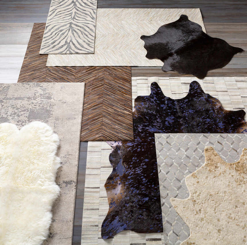 Assorted Lares Area Rug styles: animal print, geometric, hide, and shag rugs in charcoal, beige, gray, and tan. Styleshot
