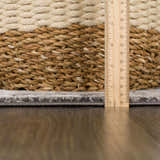 Close-up of the Minoa Area Rug showing the pile height and construction details with a ruler for scale. Pile
