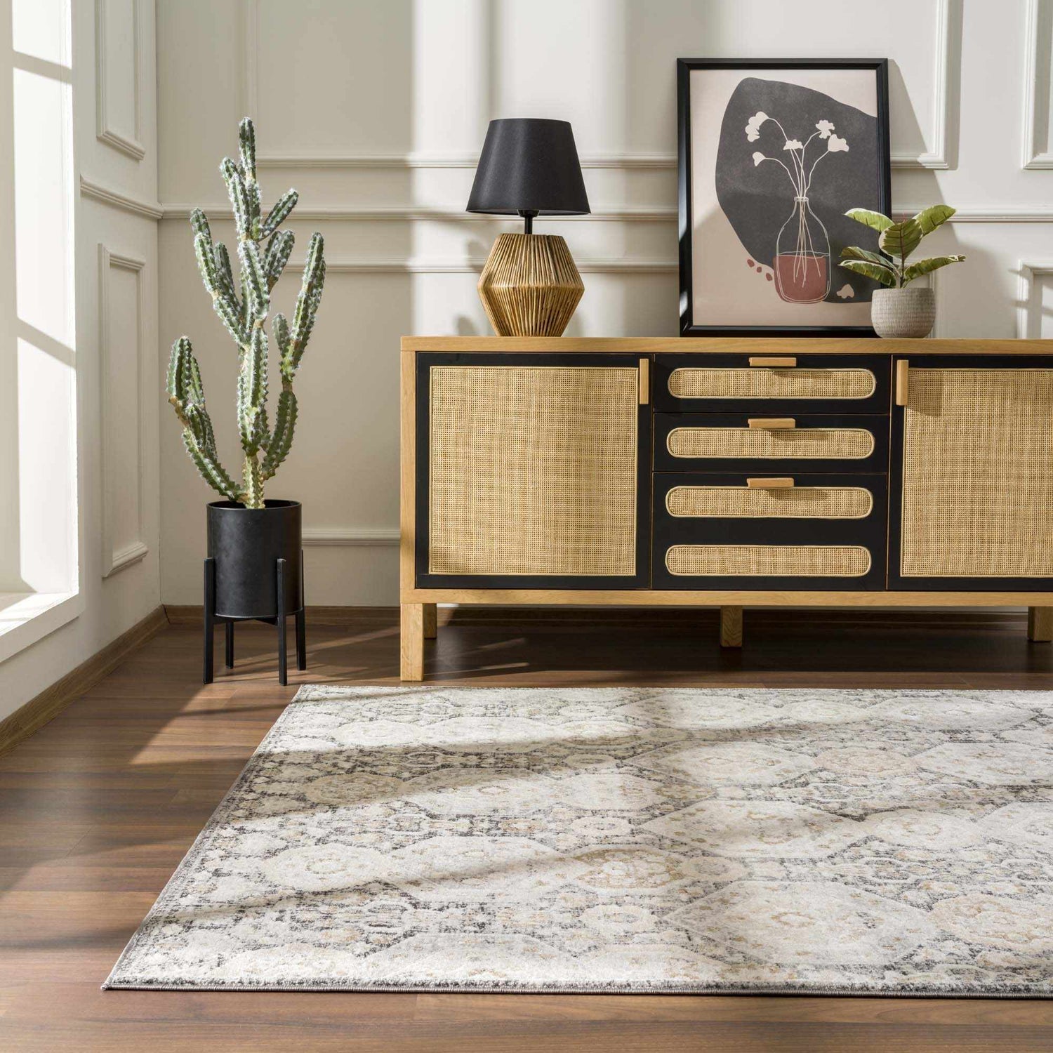 Living room scene with beige Minoa Area Rug, wood floors, and a black and tan mid-century modern cabinet. Roomscene-Rectangle