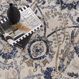 Close-up of the Georgiana Blue & Beige Oushak Rug, showcasing its floral, bohemian pattern and soft beige, blue, and tan colors. Styleshot