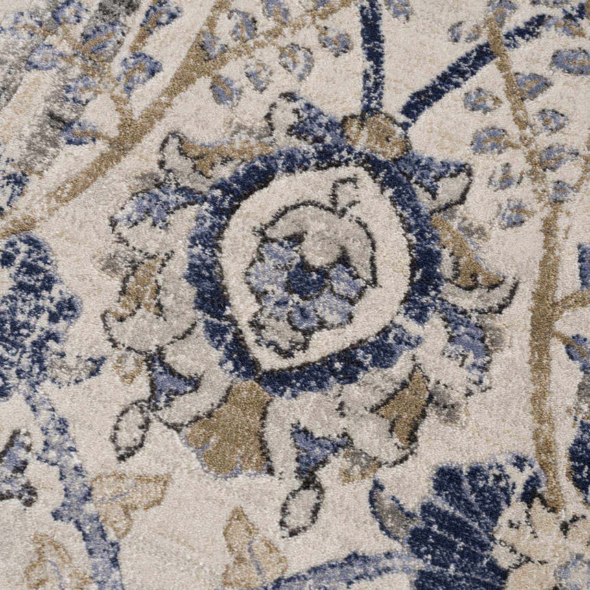 Close-up of the Georgiana Blue & Beige Oushak Rug, showcasing its floral pattern and soft, textured weave. Texture