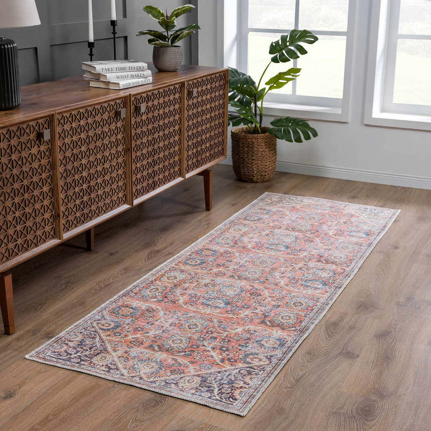 Hallway scene with Konstantina Washable Area Rug runner in peach, navy, and beige. Vintage Persian rug near wood cabinet. Roomscene-Runner