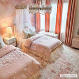 Blush pink kids bedroom with two beds, crystal chandelier, and Kandos Blush & Light Pink Area Rug. Roomscene-Rectangle
