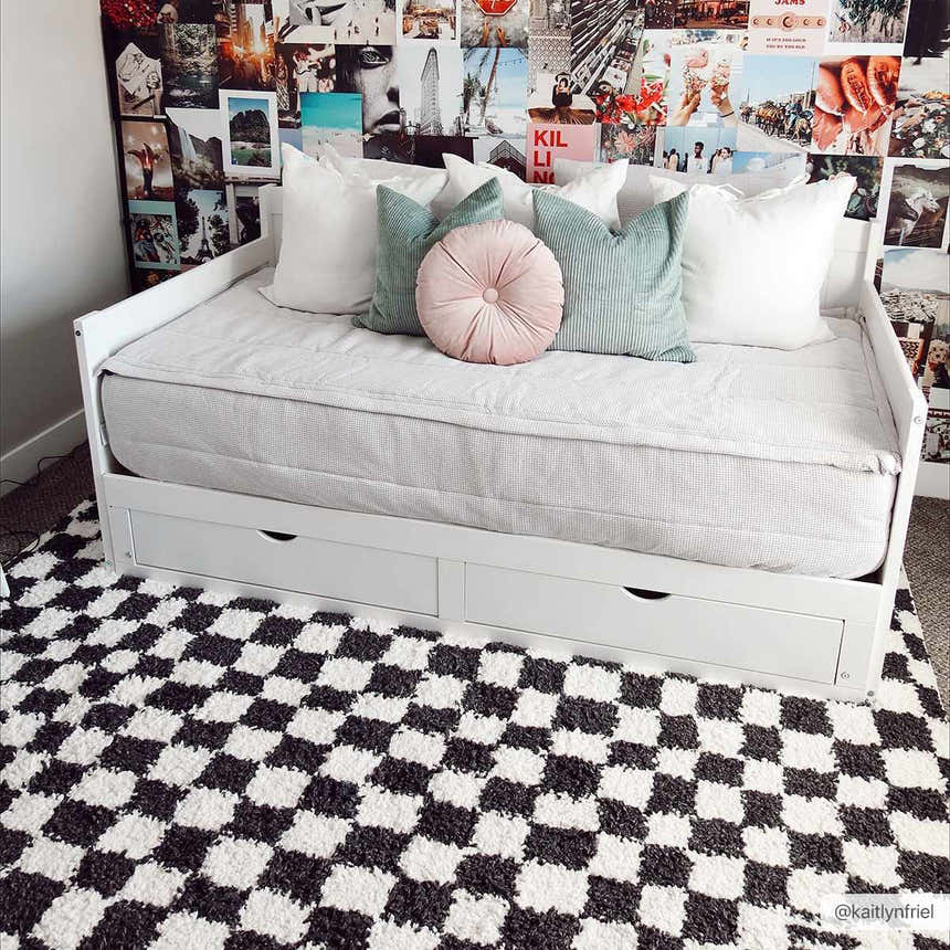 Teen bedroom with a white daybed on a Kieu Black & White Checkered Shag Rug. Collage wall. Roomscene-Rectangle