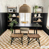 Home office with black desk on Kieu Mustard & Ivory Checkered Area Rug. Bohemian style with woven stools and shelving. Roomscene-Rectangle
