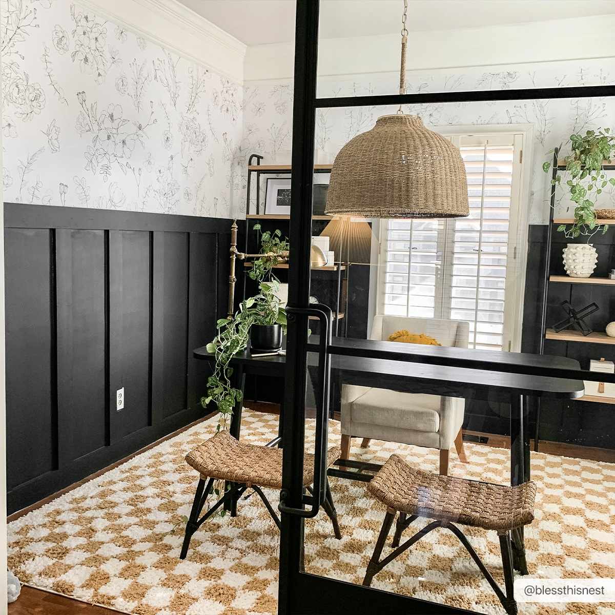 Home office with black walls and Kieu Mustard & Ivory Checkered Area Rug, woven stools, and a black desk. Roomscene-Rectangle