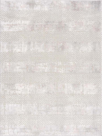 Close-up of the Bucky Area Rug. Gray and pink rug with a contemporary geometric pattern and distressed texture. Design-Rectangle-46
