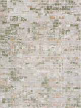 Close-up of the Liveri Green Mosaic Rug. Abstract design with green, gold, and ivory hues. Machine woven texture. Design-Rectangle