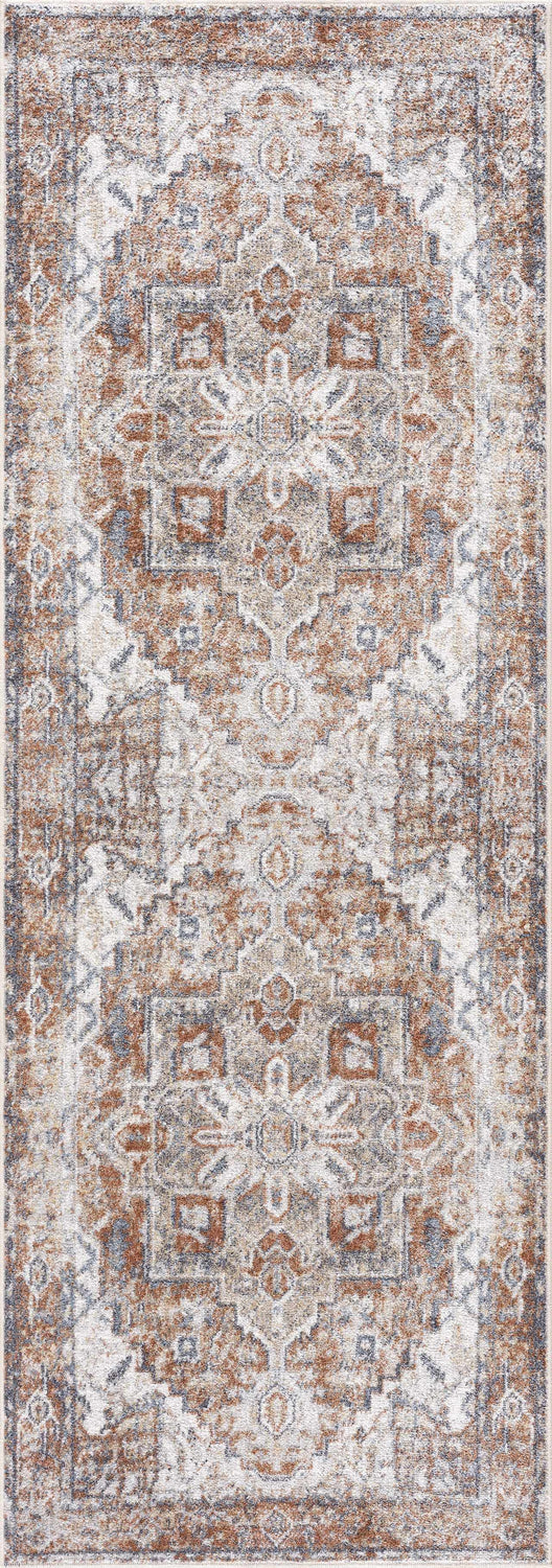 Close-up of the Rust Hera Washable Area Rug, showcasing its traditional rust, tan, and blue vintage-inspired pattern. Design-Runner-2773