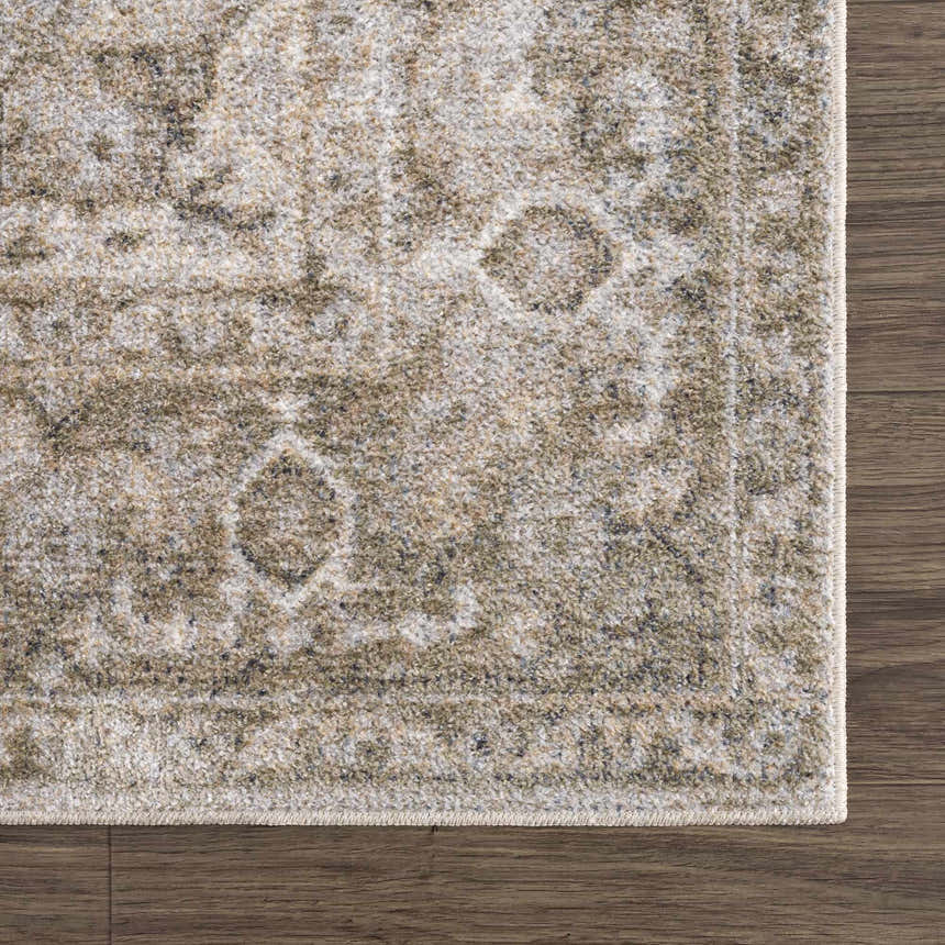 Close-up of the Gael Boutique Washable Rug. Traditional, vintage style with light blue, olive, tan and yellow tones. Swatch