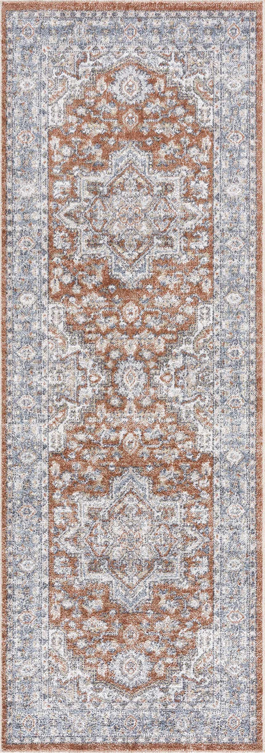 Close-up of Ember Washable Area Rug in Clay and Beachhouse. Traditional farmhouse style with distressed medallion pattern. Design-Runner-2773