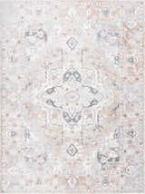 Close-up of Dobry Boutique Washable Rug. Machine-woven polyester rug in blue, off-white, and tan with a vintage oriental pattern. Design-Rectangle-5373