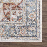 Close-up of the Akram Gray & Orange Washable Area Rug, showing its traditional vintage design and soft polyester texture. Swatch