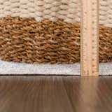 Close-up of Akram Gray & Orange Washable Area Rug showing pile height and texture with a ruler for scale. Pile