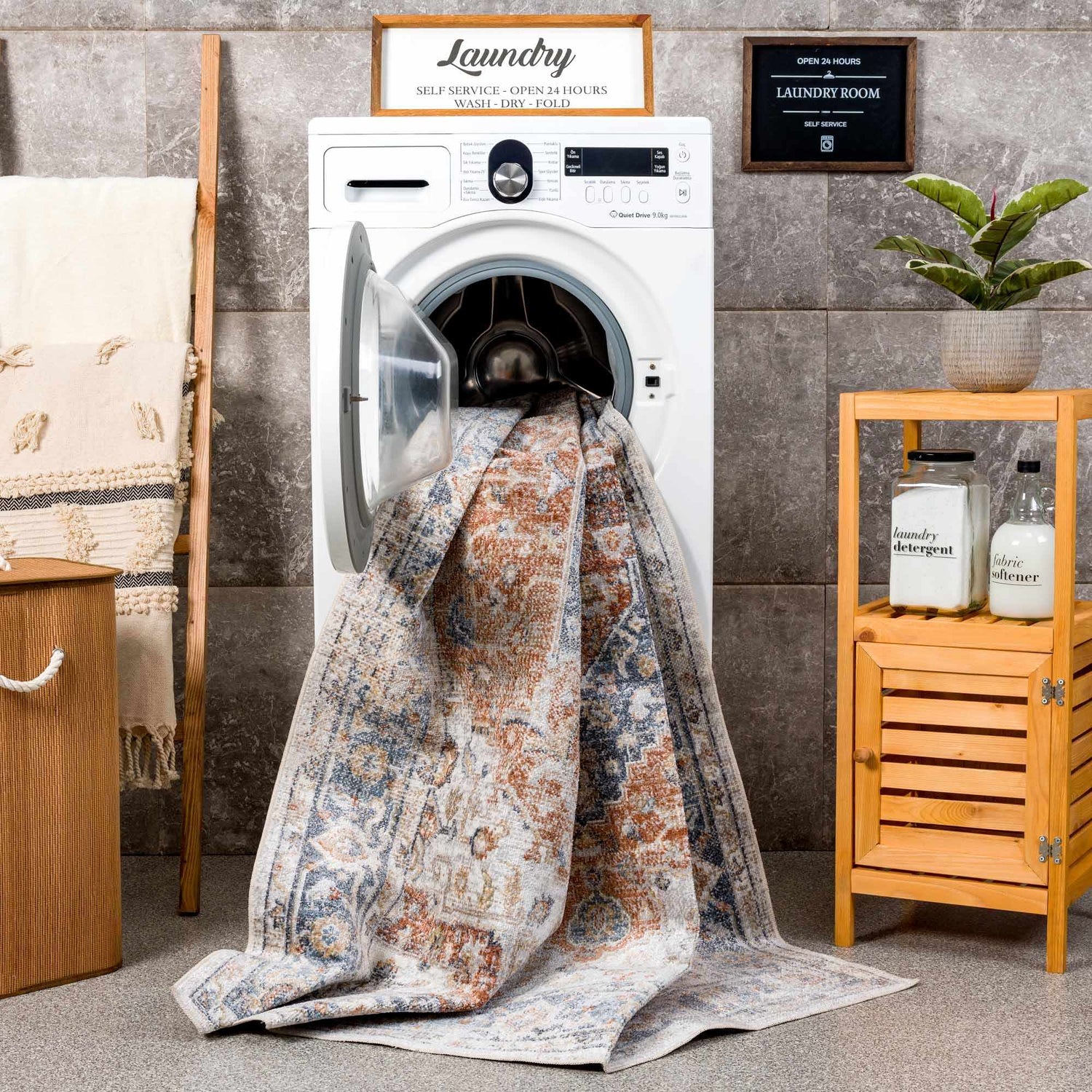 Laundry room scene with Akram Gray & Orange Washable Area Rug being washed in a front load washing machine. Washing-Machine