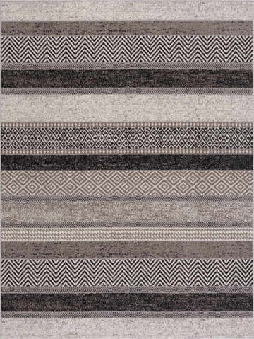 Close-up of Middlestown Washable Area Rug. Features stripes and geometric patterns in black, cream, gray, and beige hues. Design-Rectangle-537