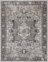 Close-up of the Cabacungan Washable Area Rug. Bohemian style rug in black, gray, beige and taupe with a traditional, vintage pattern. Design-Rectangle-537